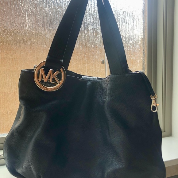 MICHAEL Michael Kors Handbags - Black leather Michael Kors shoulder bag w/ gold MK logo. Dust bag included.